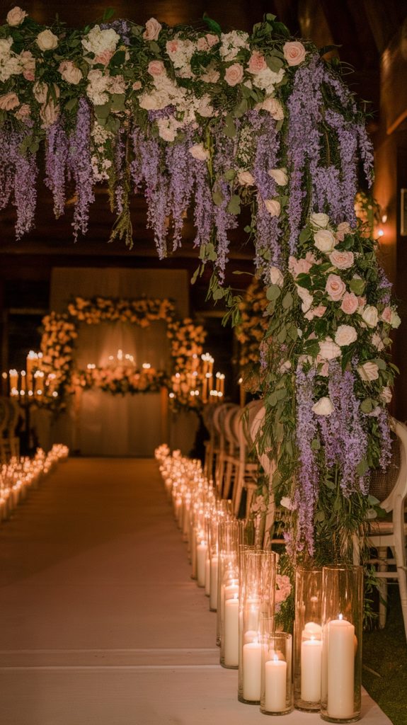 A wedding aisle adorned with cascading purple wisteria, blush roses, and flickering candles leads to a floral arch.